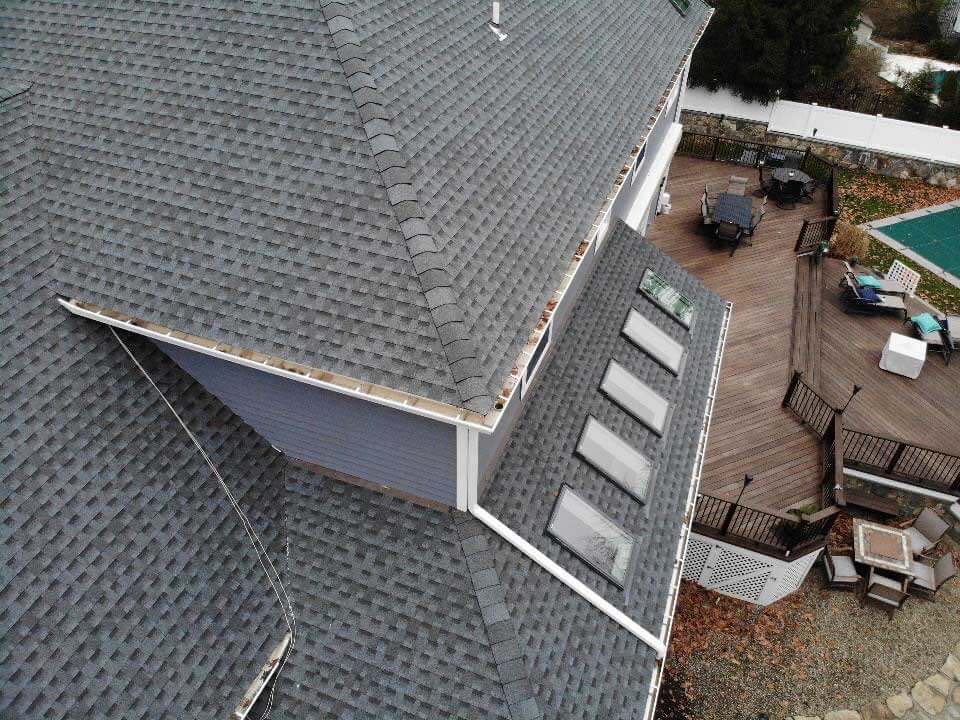 Overhead view of GAF asphalt shingles on home with skylights