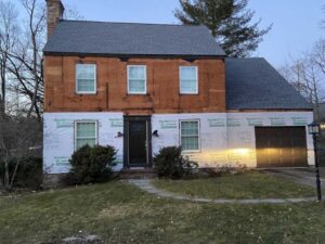 Home with siding renovation in progress