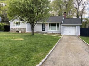 View of front of home with new gray HardiePlank siding