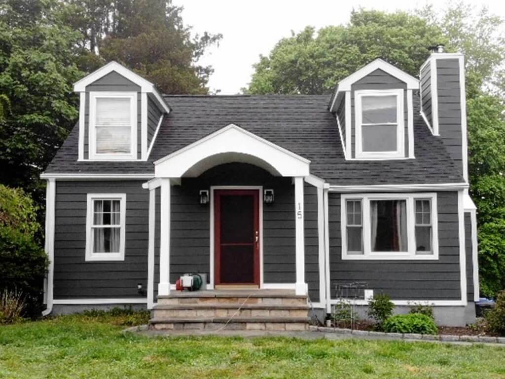 Front view of home with dark gray James Hardie siding replacement in Rye, NY