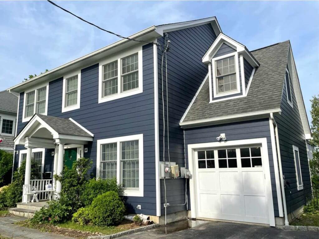 Front view of home with blue James Hardie siding