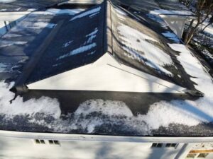 Aerial view of GAF asphalt shingles on home in Westport