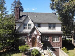 front view of home with asphalt shingle replacement