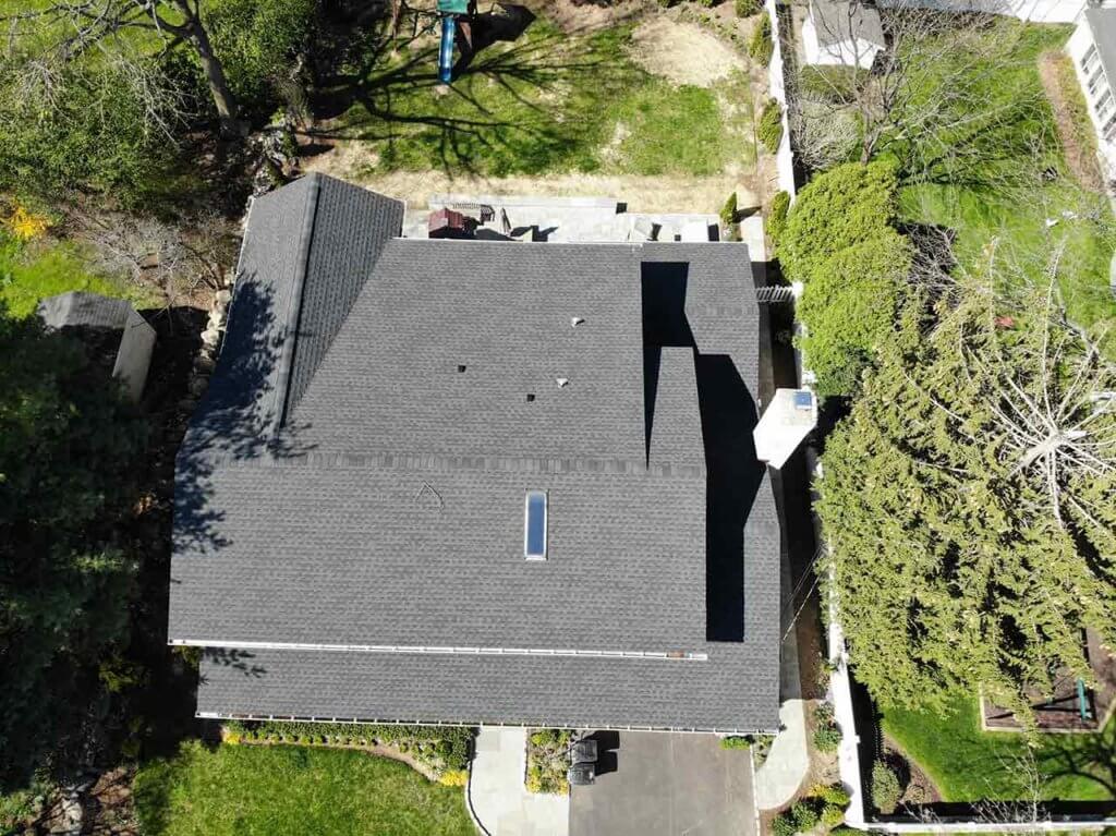 Aerial view of home with asphalt shingles