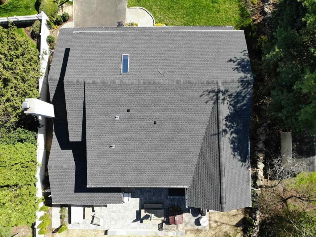 Aerial view of home with asphalt shingles