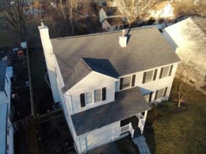 White home with gray GAF asphalt shingles in Stamford, CT