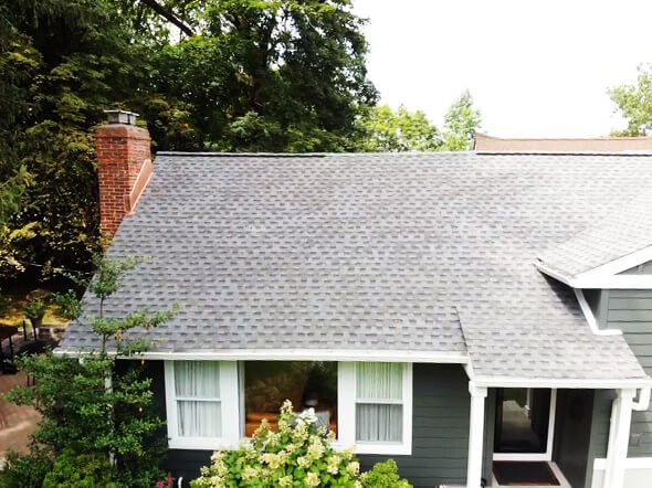 Side view of asphalt shingles on home in Tarrytown