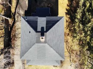 Overhead view of home with gray asphalt shingle replacement