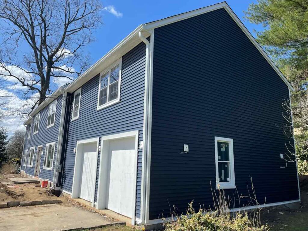 Royal blue vinyl siding on home