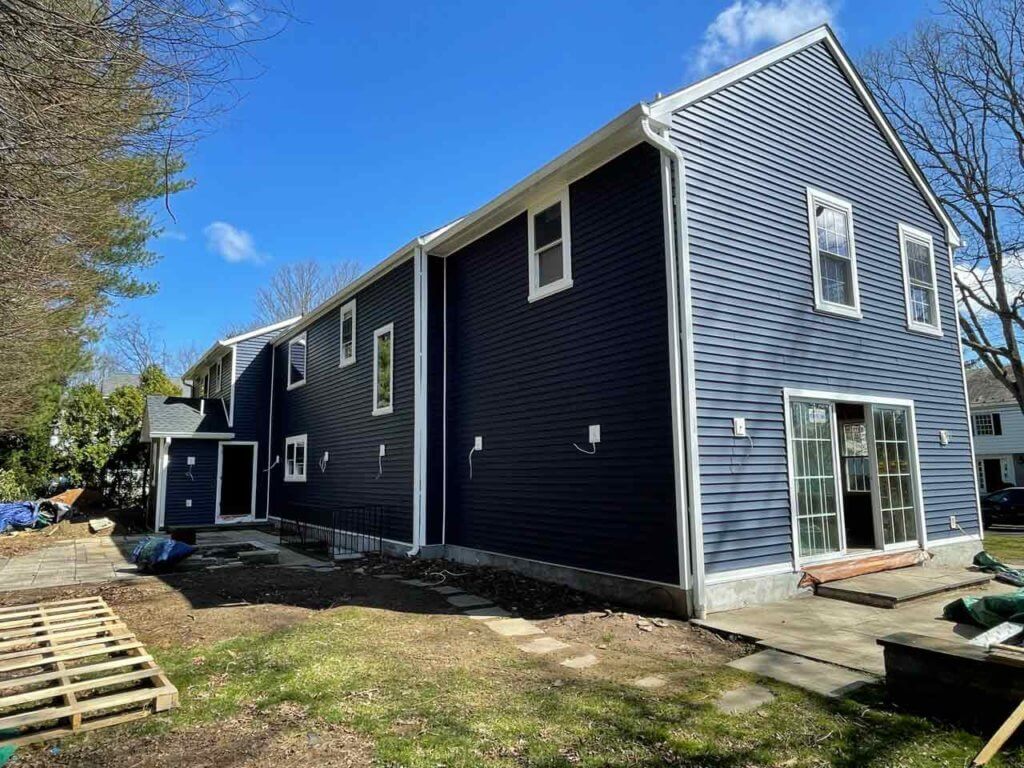 Royal blue vinyl siding on home