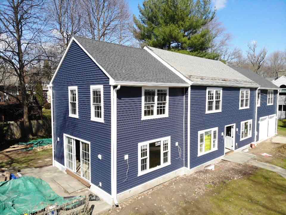 Royal blue vinyl siding on home