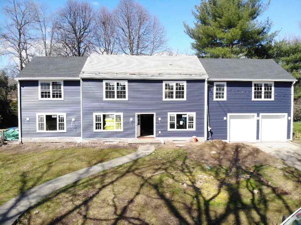 Royal blue vinyl siding on home