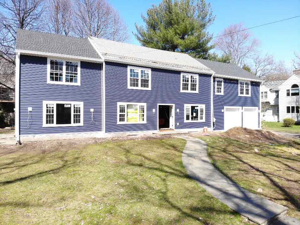 Royal blue vinyl siding on home