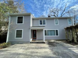 Front of home with beige James Hardie siding in Stamford, CT