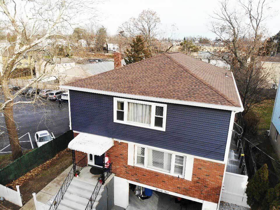 side view of Royal vinyl siding replacement