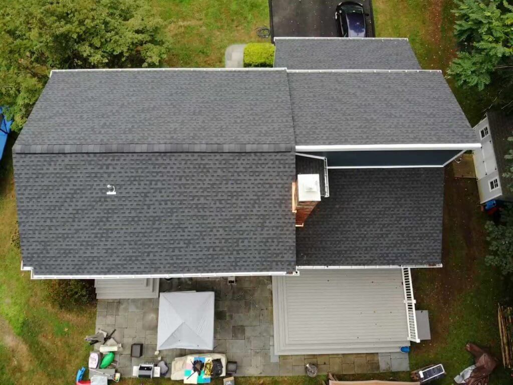 home with GAF asphalt shingles and James Hardie siding replacement