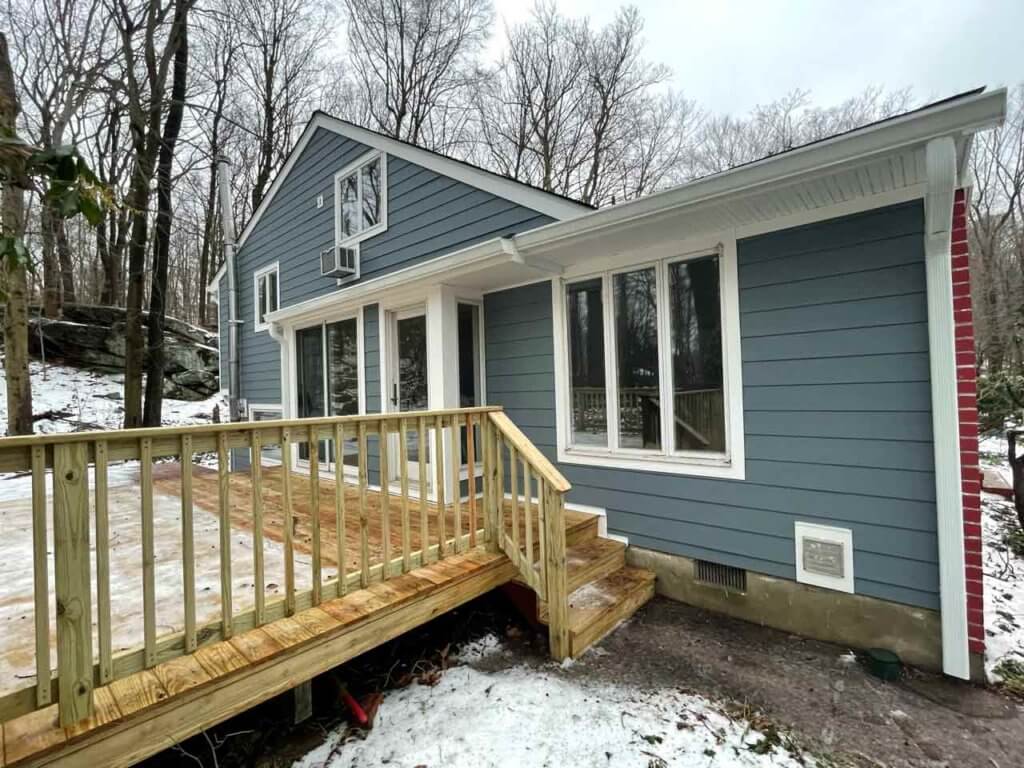 Side view of blue James Hardie siding on home