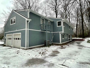 Side view of home with Booth Bay Blue James Hardie siding