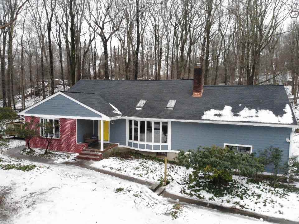 Side view of blue James Hardie siding on home