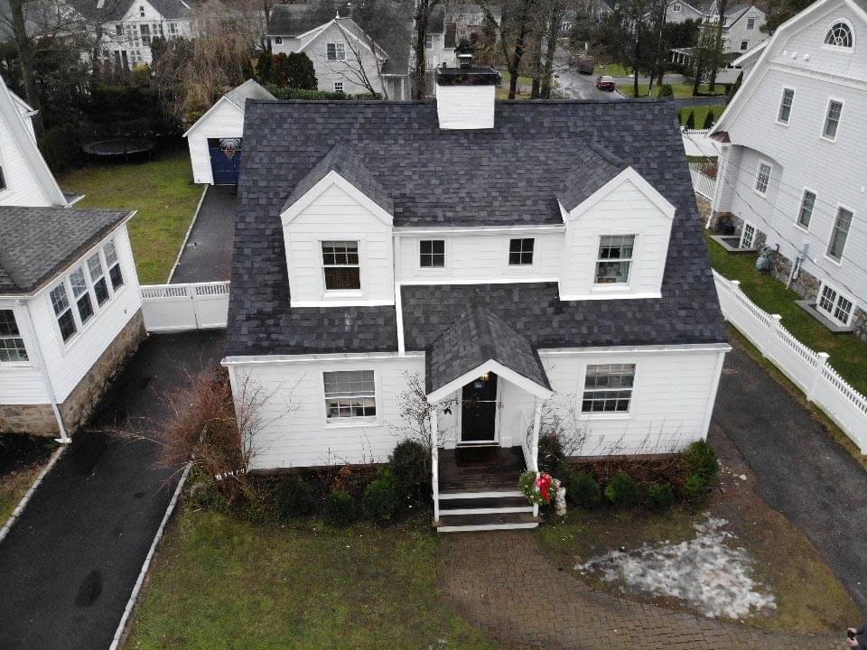 Aerial view of white James Hardie siding on home