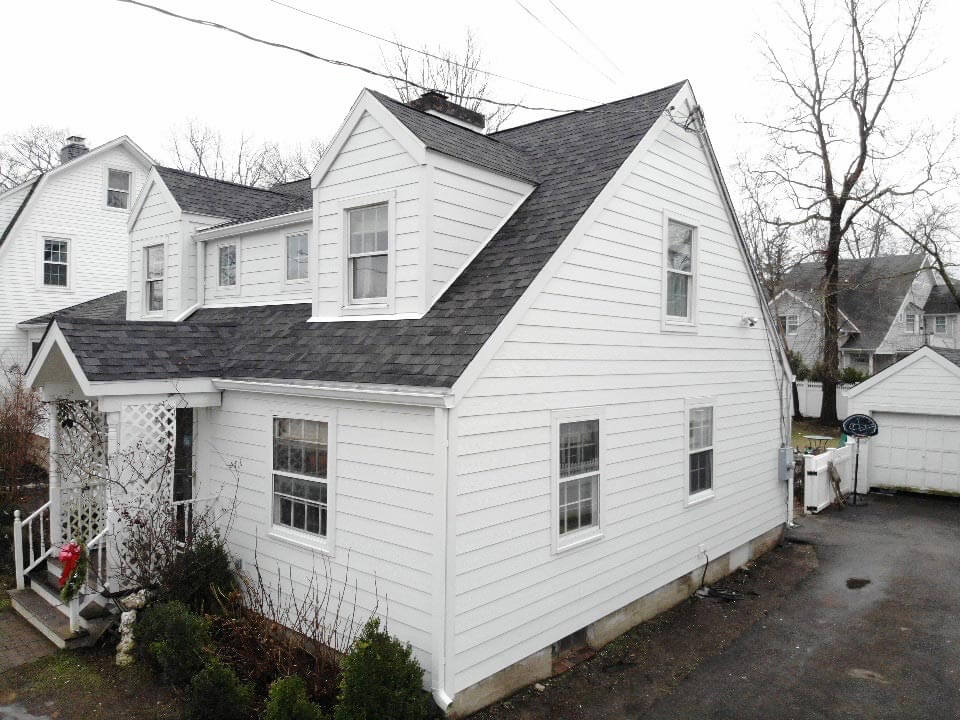 Side view of white James Hardie siding on home