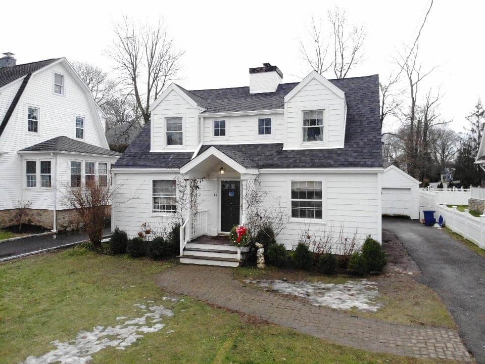 Side view of white James Hardie siding on home