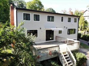 Rear of home with Andersen window replacement in Scarsdale