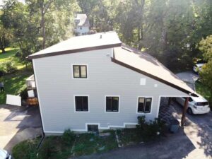 White home with Andersen window replacement in Scarsdale