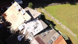 Aerial view of roofing installation in progress