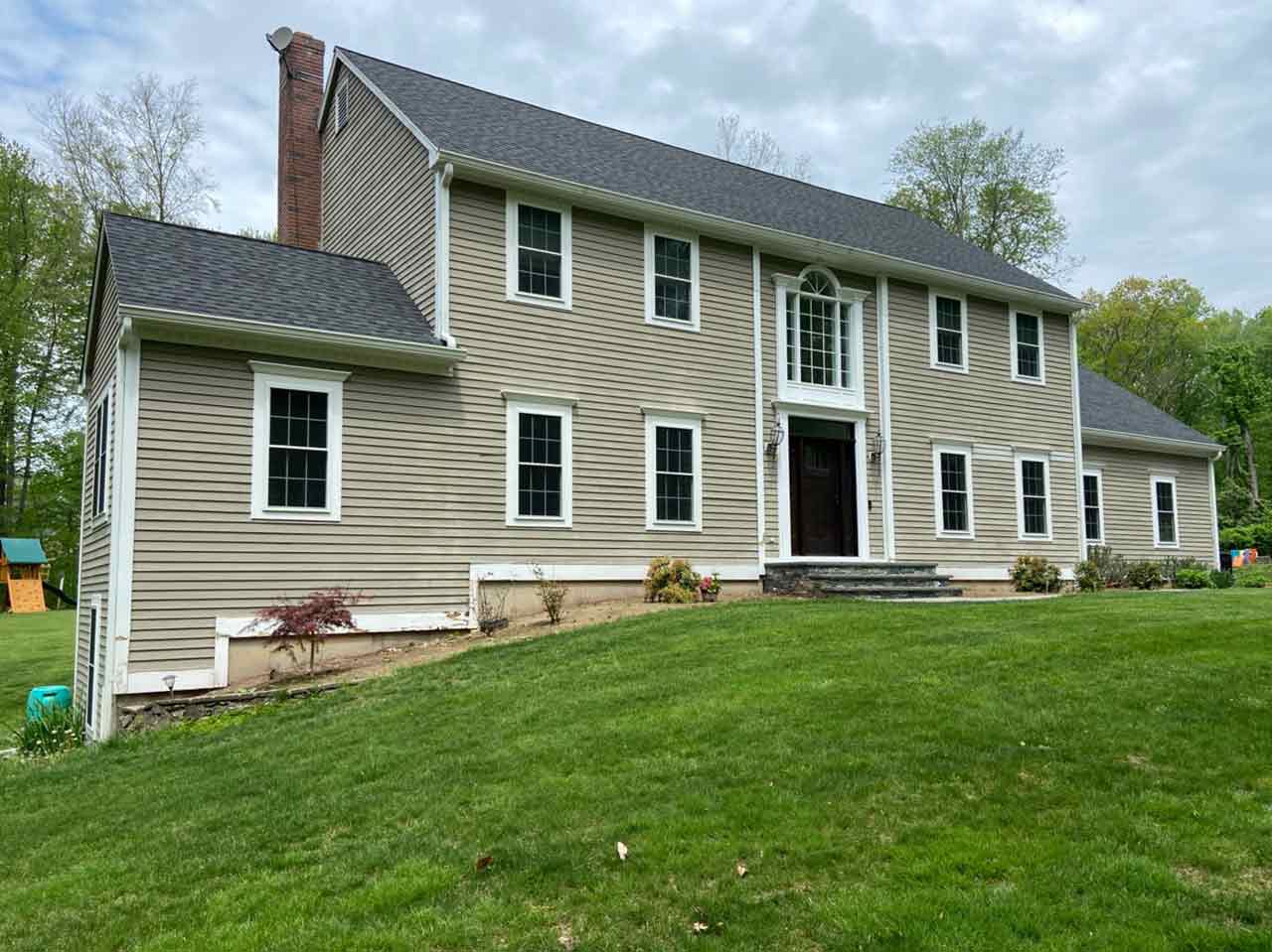 Andersen windows on beige home