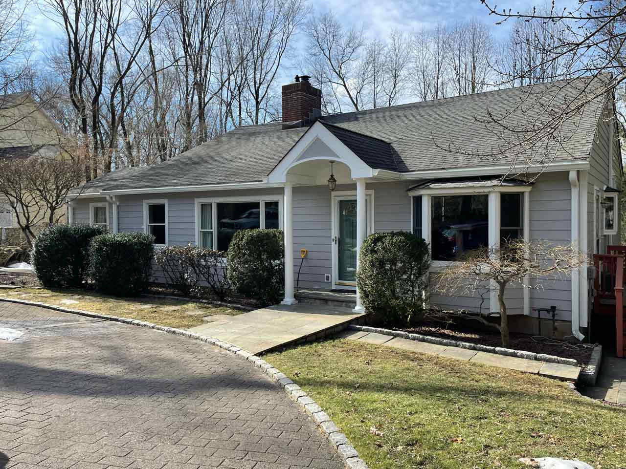 Andersen windows on gray home