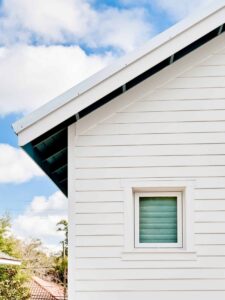 Home with white siding and Hardie trim