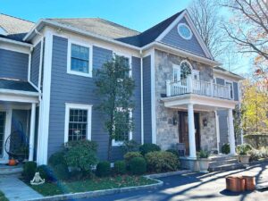 Home with blue siding and white trim