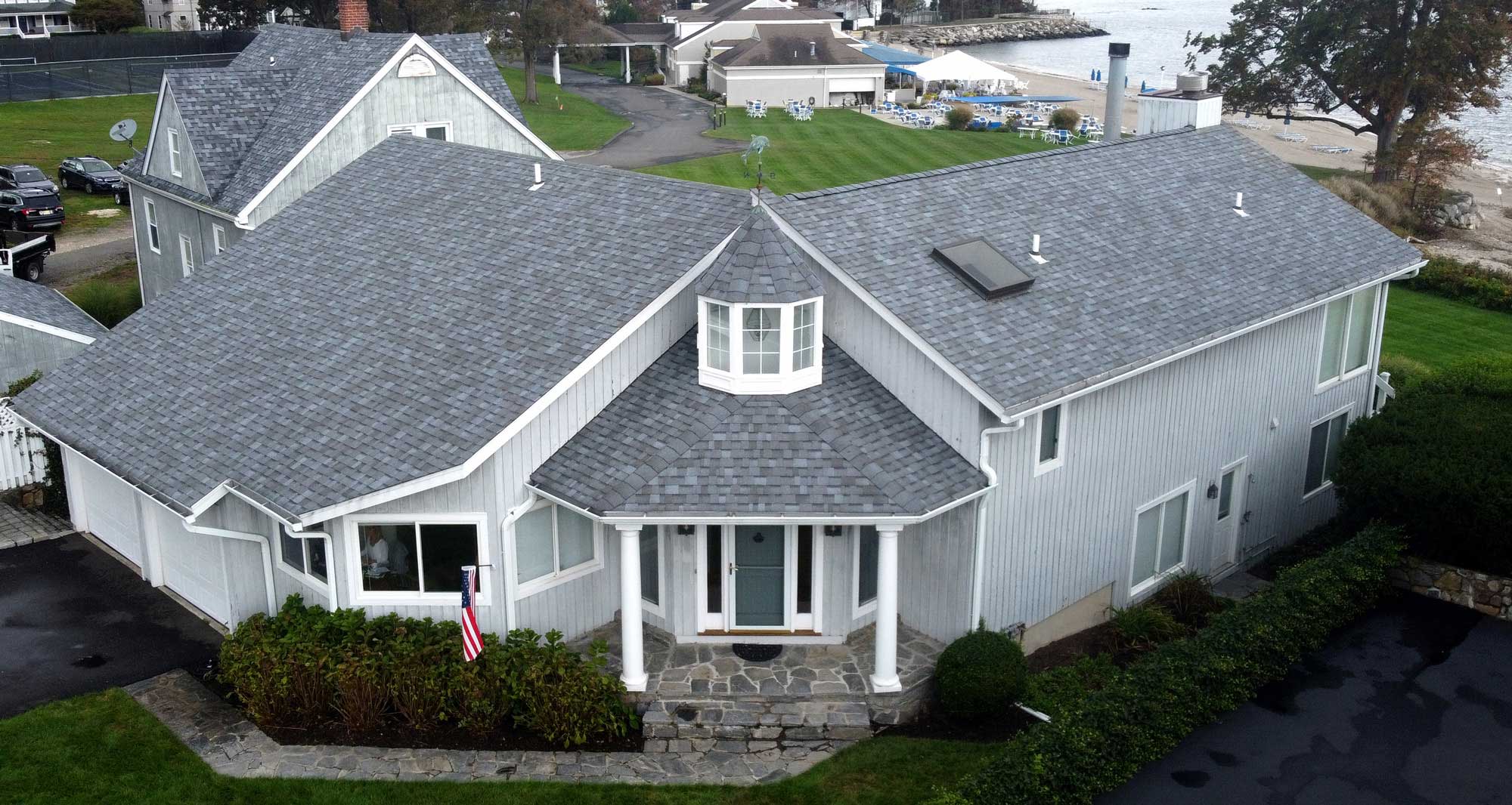 Gray home with asphalt shingles