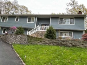 Front of home with James Hardie siding in Boothbay blue