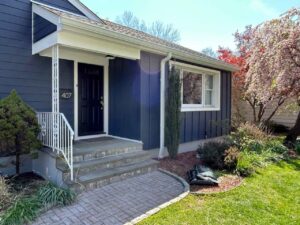 Front of home with James Hardie siding in Deep ocean blue