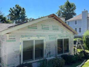 new double window install on side of house