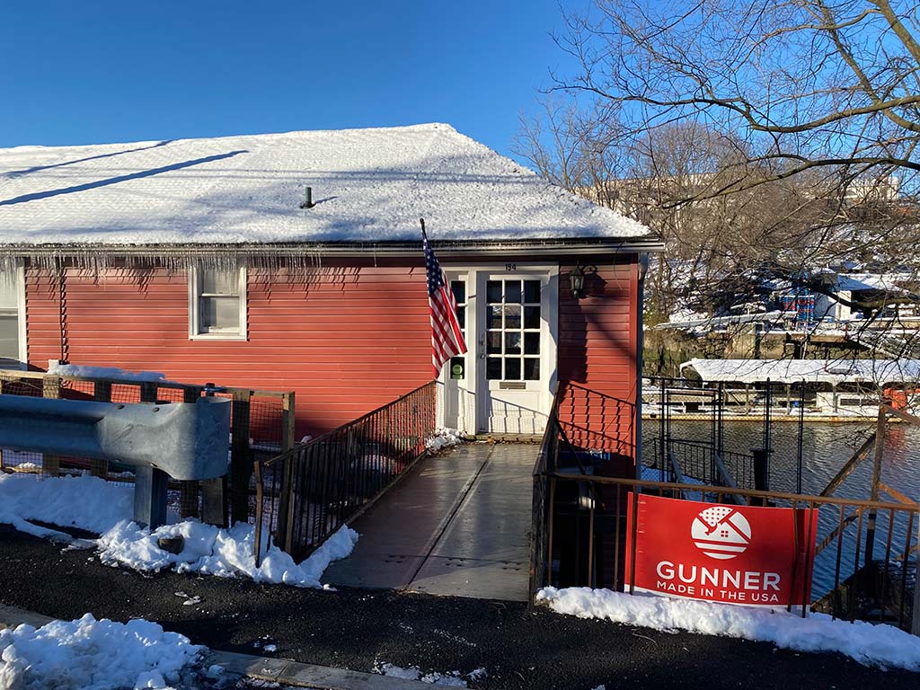 Gunner Roofing old office with snow on top